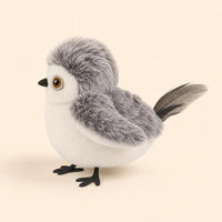 Pájaro Nieve de PawsAddict visto de perfil